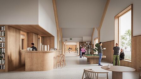 Een huiskamer met doorzicht naar de gymzaal